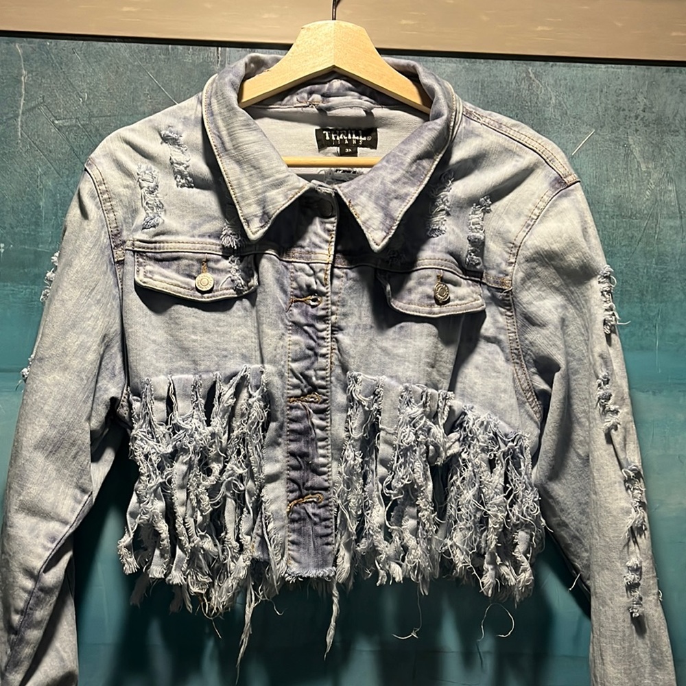 Fringed and distressed Women’s ripped Jean jacket